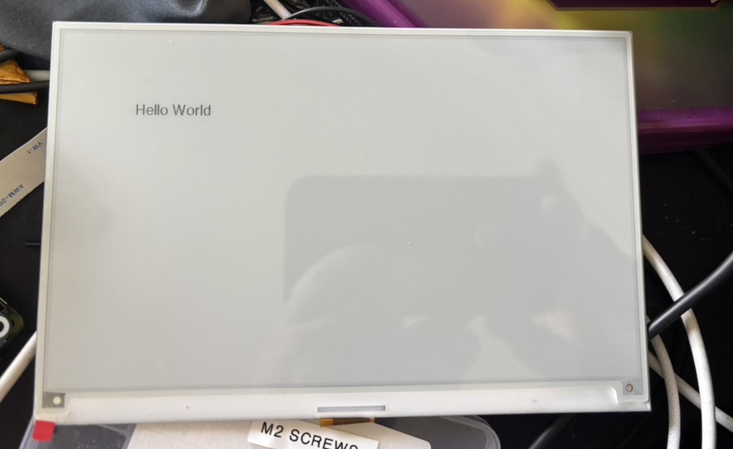E-ink display showing hello world
